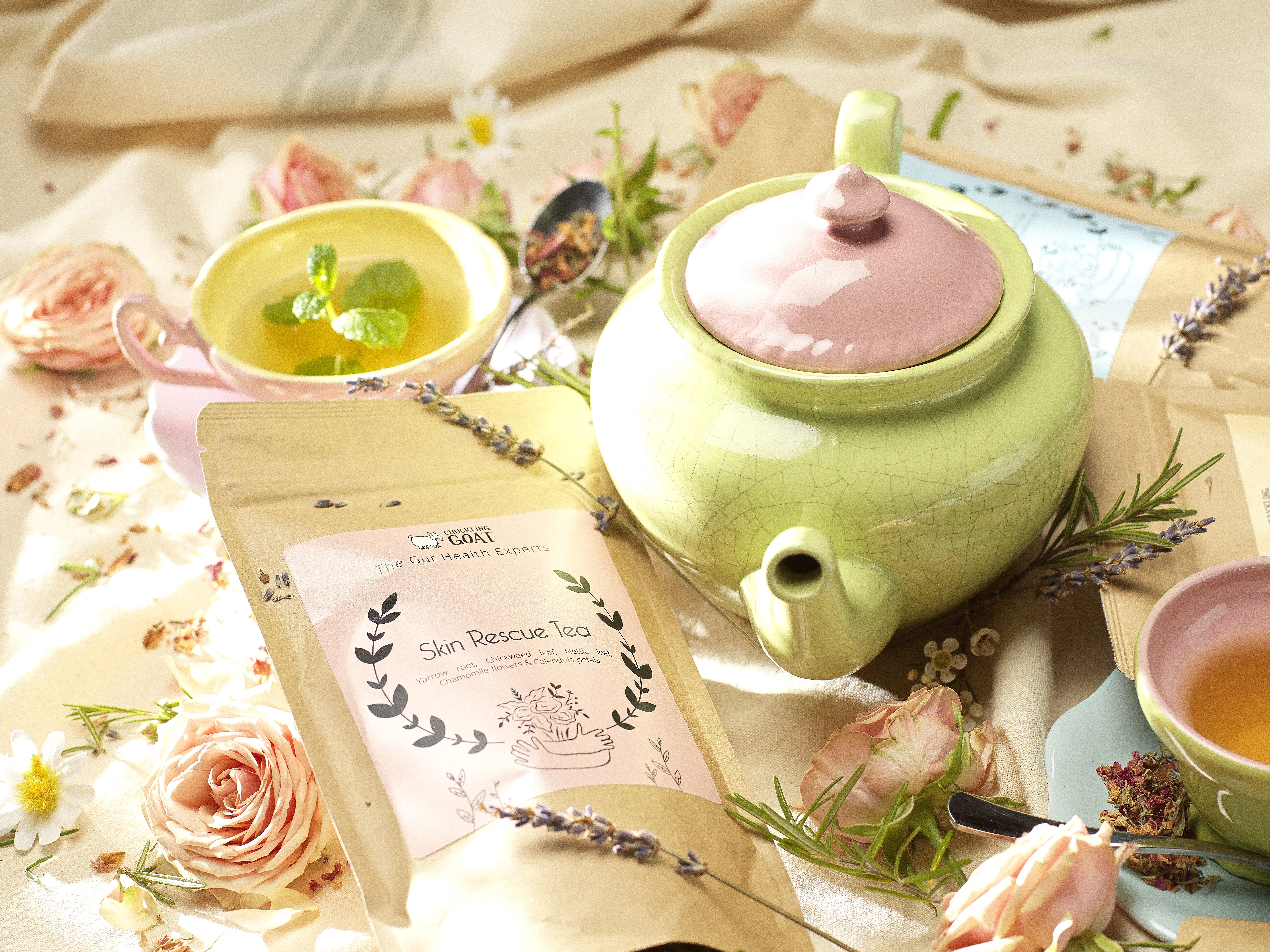 Image of cute colourful teapot and tea arrangement.