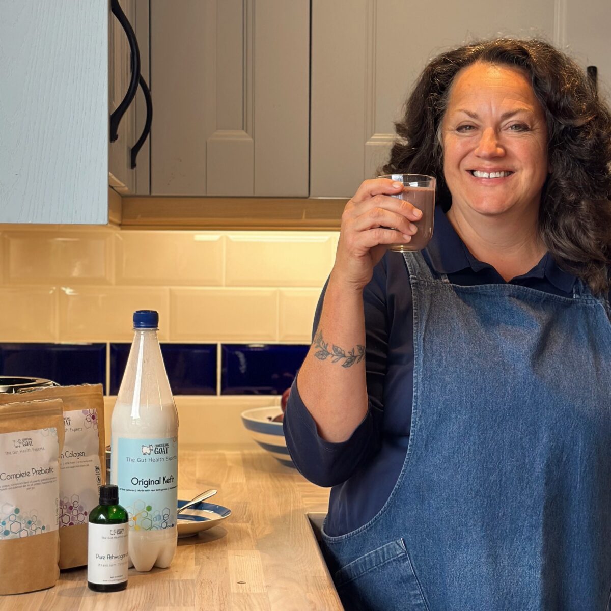 Image of Shann Jones, Chuckling Goat Director, holding kefir smoothie.