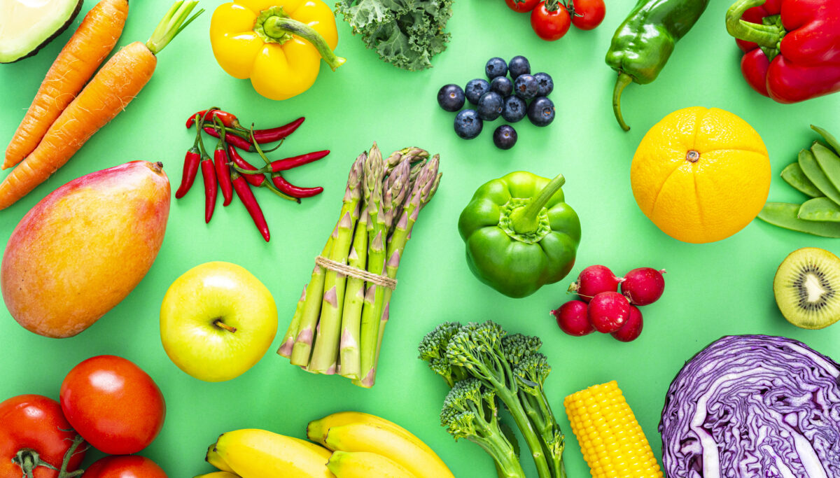 Prebiotic food, fibre-rich food on green background, healthy
